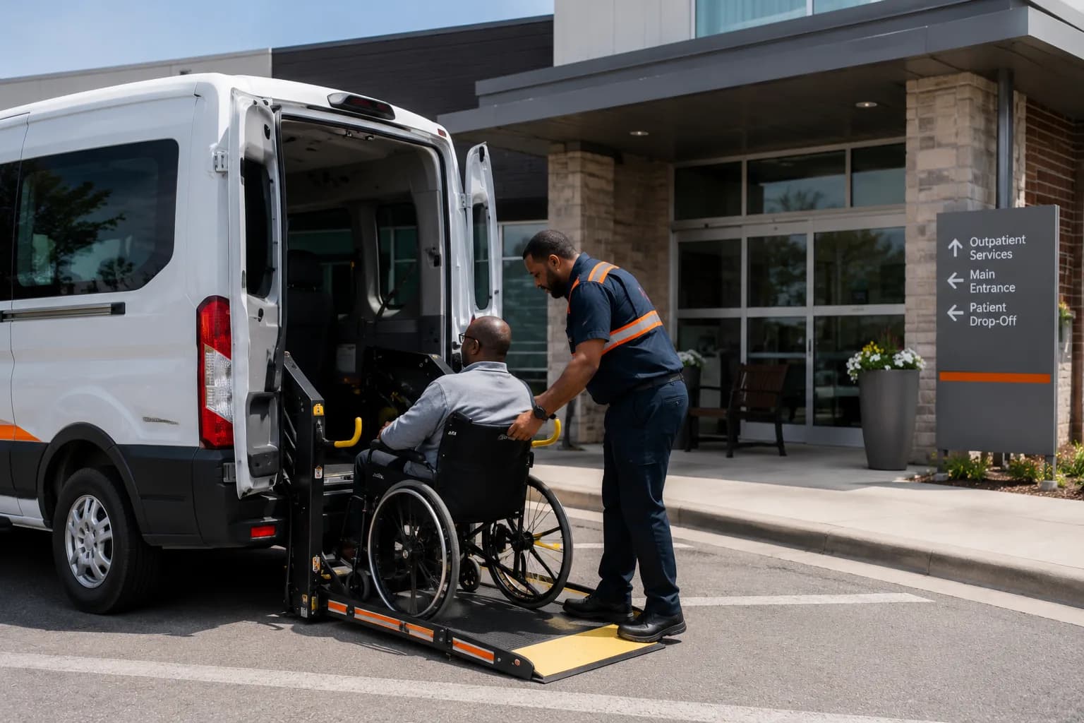 A NEMT driver performing a pre-trip safety check beside an accessible van in early-morning light.